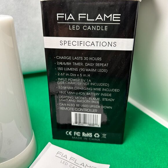 FIA Flame Candles. Set of 2, have 2 remotes and 1 box. Charging cables included. - Picture 3 of 6